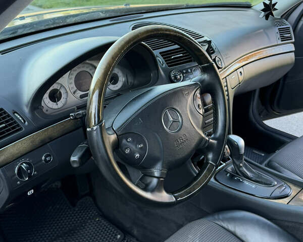 Чорний Мерседес Е-Клас, об'ємом двигуна 1.8 л та пробігом 200 тис. км за 6400 $, фото 16 на Automoto.ua