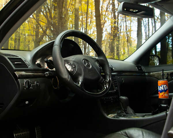 Чорний Мерседес Е-Клас, об'ємом двигуна 5 л та пробігом 202 тис. км за 15000 $, фото 15 на Automoto.ua