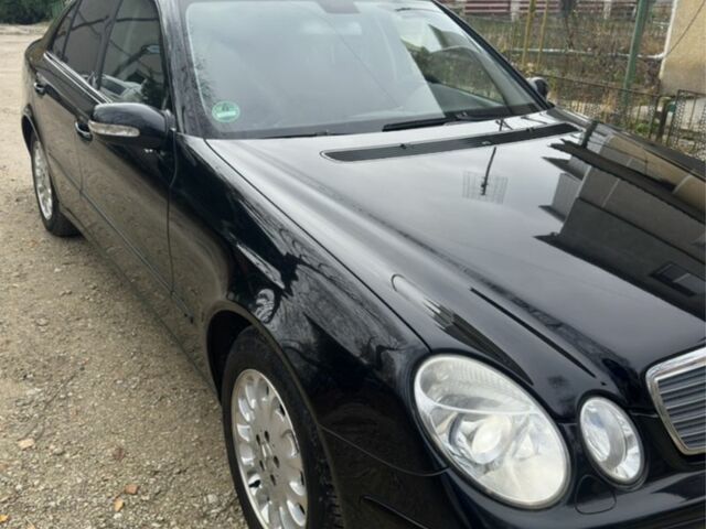 Черный Мерседес Е-Класс, объемом двигателя 1.8 л и пробегом 268 тыс. км за 7700 $, фото 1 на Automoto.ua