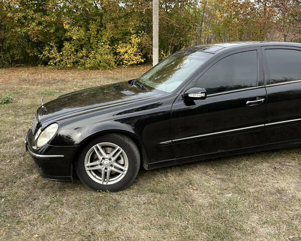 Черный Мерседес Е-Класс, объемом двигателя 2 л и пробегом 355 тыс. км за 6200 $, фото 1 на Automoto.ua