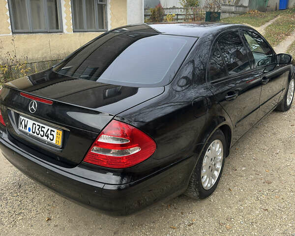 Черный Мерседес Е-Класс, объемом двигателя 1.8 л и пробегом 267 тыс. км за 6950 $, фото 12 на Automoto.ua