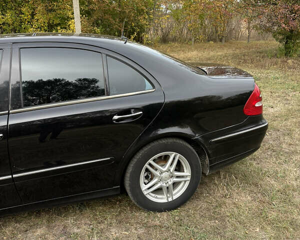 Черный Мерседес Е-Класс, объемом двигателя 2 л и пробегом 355 тыс. км за 6200 $, фото 2 на Automoto.ua