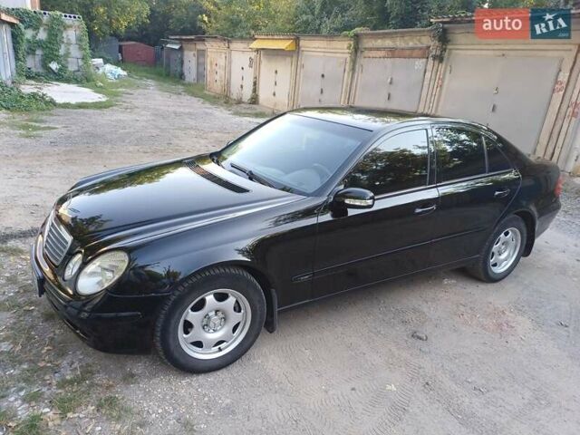 Чорний Мерседес Е-Клас, об'ємом двигуна 1.8 л та пробігом 388 тис. км за 8300 $, фото 1 на Automoto.ua