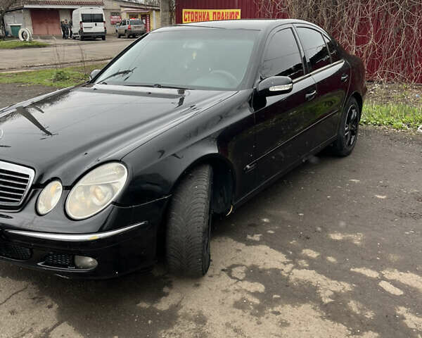 Черный Мерседес Е-Класс, объемом двигателя 2.2 л и пробегом 490 тыс. км за 3100 $, фото 3 на Automoto.ua