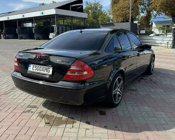 Черный Мерседес Е-Класс, объемом двигателя 4.97 л и пробегом 360 тыс. км за 10000 $, фото 2 на Automoto.ua