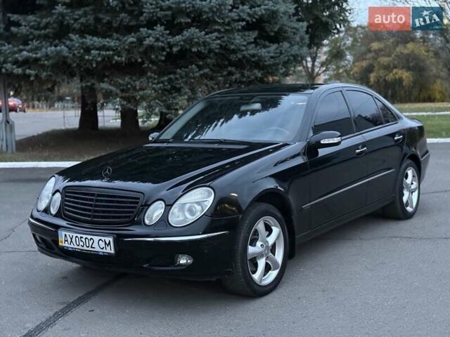 Мерседес Е-Клас 2005 у Рівному на Automoto.ua Чорний Мерседес Е-Клас, об'ємом двигуна 1.8 л та пробігом 255 тис. км за 5800 $, фото 1 на Automoto.ua