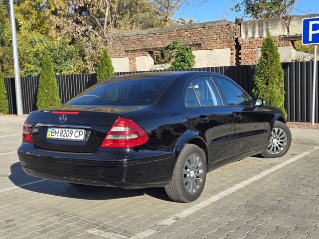 Черный Мерседес Е-Класс, объемом двигателя 1.8 л и пробегом 265 тыс. км за 6999 $, фото 6 на Automoto.ua