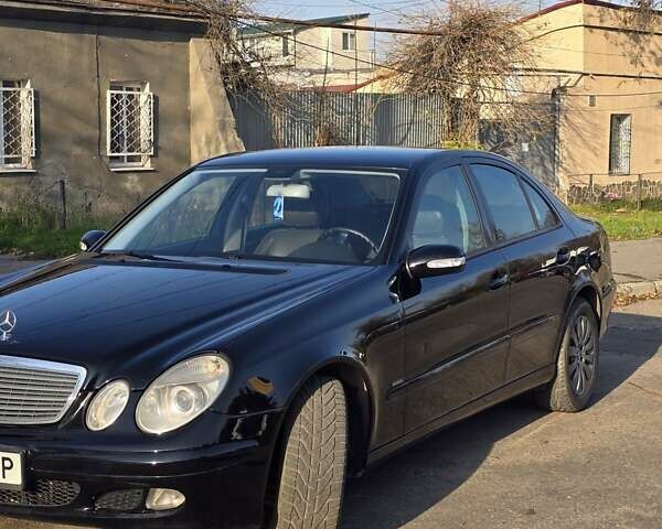 Черный Мерседес Е-Класс, объемом двигателя 1.8 л и пробегом 267 тыс. км за 6600 $, фото 5 на Automoto.ua