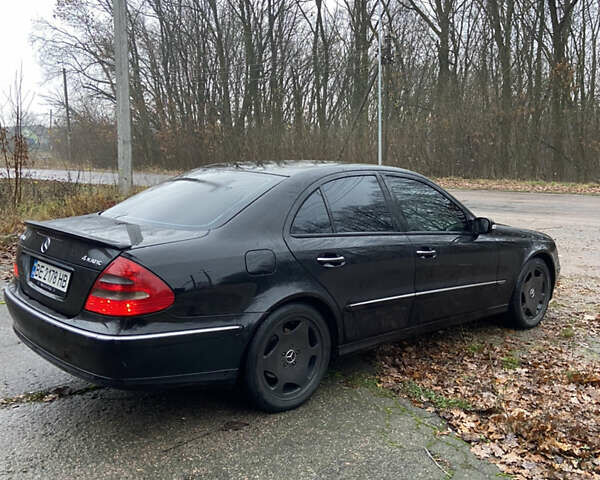 Черный Мерседес Е-Класс, объемом двигателя 2.6 л и пробегом 285 тыс. км за 5400 $, фото 1 на Automoto.ua