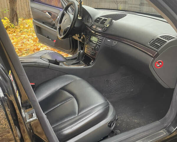 Черный Мерседес Е-Класс, объемом двигателя 1.8 л и пробегом 396 тыс. км за 5999 $, фото 12 на Automoto.ua