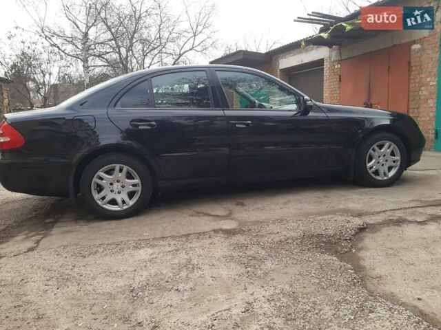 Черный Мерседес Е-Класс, объемом двигателя 1.8 л и пробегом 220 тыс. км за 8650 $, фото 2 на Automoto.ua