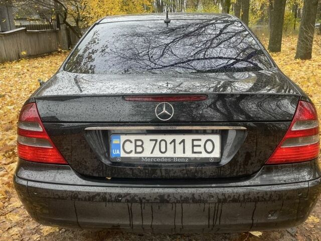 Мерседес Е-Клас 2005 у Прилуках на Automoto.ua Чорний Мерседес Е-Клас, об'ємом двигуна 1.8 л та пробігом 395 тис. км за 6499 $, фото 5 на Automoto.ua