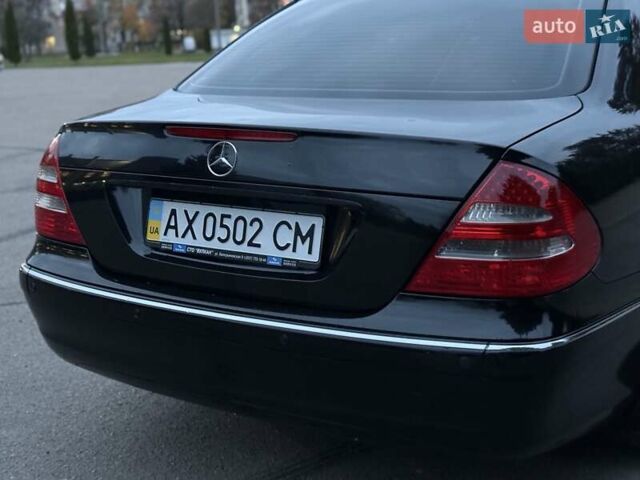 Мерседес Е-Клас 2005 у Рівному на Automoto.ua Чорний Мерседес Е-Клас, об'ємом двигуна 1.8 л та пробігом 255 тис. км за 5800 $, фото 25 на Automoto.ua