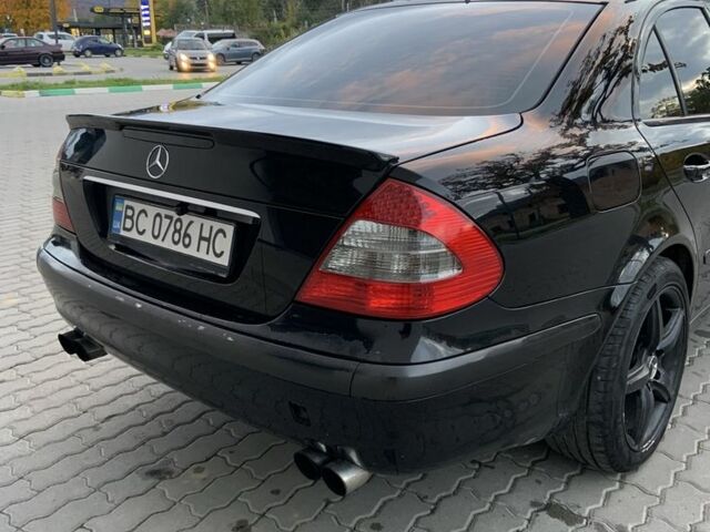 Чорний Мерседес Е-Клас, об'ємом двигуна 2 л та пробігом 375 тис. км за 5600 $, фото 4 на Automoto.ua