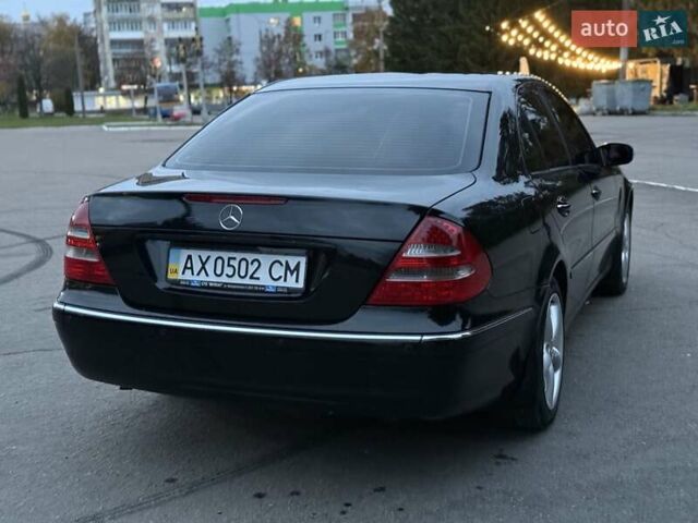 Мерседес Е-Клас 2005 у Рівному на Automoto.ua Чорний Мерседес Е-Клас, об'ємом двигуна 1.8 л та пробігом 255 тис. км за 5800 $, фото 24 на Automoto.ua