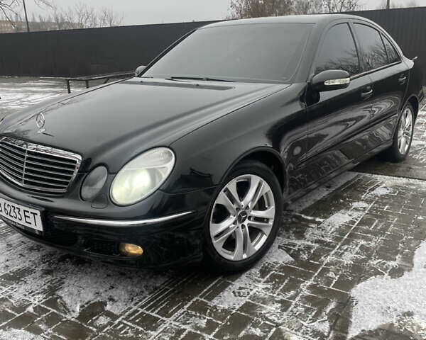 Черный Мерседес Е-Класс, объемом двигателя 1.8 л и пробегом 396 тыс. км за 5999 $, фото 5 на Automoto.ua
