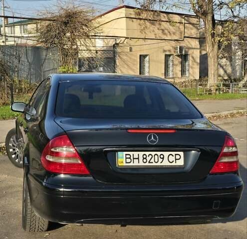Черный Мерседес Е-Класс, объемом двигателя 1.8 л и пробегом 267 тыс. км за 6600 $, фото 11 на Automoto.ua