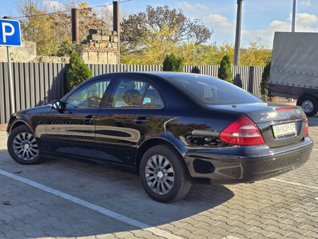 Черный Мерседес Е-Класс, объемом двигателя 1.8 л и пробегом 265 тыс. км за 6999 $, фото 7 на Automoto.ua