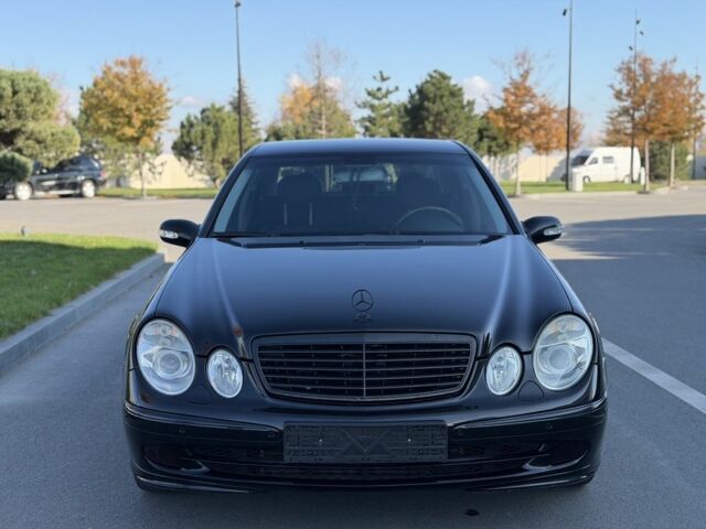 Чорний Мерседес Е-Клас, об'ємом двигуна 2 л та пробігом 200 тис. км за 6400 $, фото 1 на Automoto.ua
