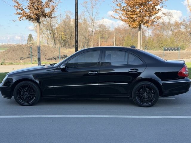 Чорний Мерседес Е-Клас, об'ємом двигуна 2 л та пробігом 200 тис. км за 6400 $, фото 3 на Automoto.ua
