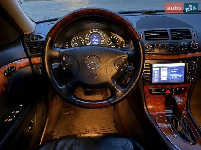 Мерседес Е-Клас 2005 у Рівному на Automoto.ua Чорний Мерседес Е-Клас, об'ємом двигуна 1.8 л та пробігом 255 тис. км за 5800 $, фото 70 на Automoto.ua