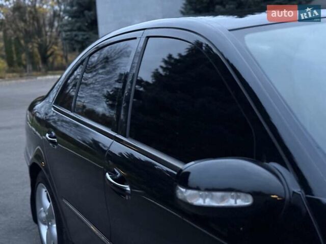 Мерседес Е-Клас 2005 у Рівному на Automoto.ua Чорний Мерседес Е-Клас, об'ємом двигуна 1.8 л та пробігом 255 тис. км за 5800 $, фото 20 на Automoto.ua