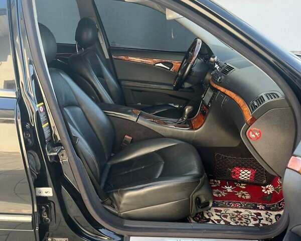 Мерседес Е-Клас 2005 у Рівному на Automoto.ua Чорний Мерседес Е-Клас, об'ємом двигуна 1.8 л та пробігом 255 тис. км за 5800 $, фото 8 на Automoto.ua
