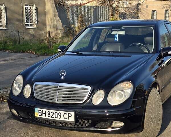 Черный Мерседес Е-Класс, объемом двигателя 1.8 л и пробегом 267 тыс. км за 6600 $, фото 4 на Automoto.ua