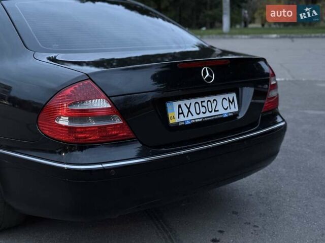 Мерседес Е-Клас 2005 у Рівному на Automoto.ua Чорний Мерседес Е-Клас, об'ємом двигуна 1.8 л та пробігом 255 тис. км за 5800 $, фото 30 на Automoto.ua