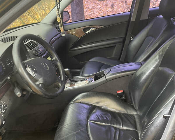 Мерседес Е-Клас 2005 у Прилуках на Automoto.ua Чорний Мерседес Е-Клас, об'ємом двигуна 1.8 л та пробігом 395 тис. км за 6499 $, фото 7 на Automoto.ua
