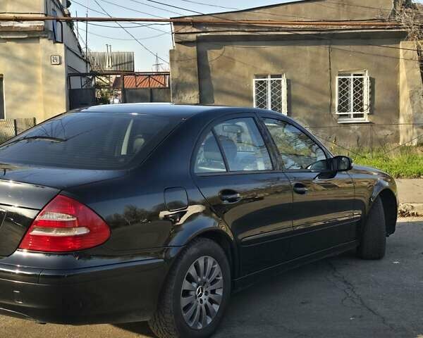 Черный Мерседес Е-Класс, объемом двигателя 1.8 л и пробегом 267 тыс. км за 6600 $, фото 13 на Automoto.ua