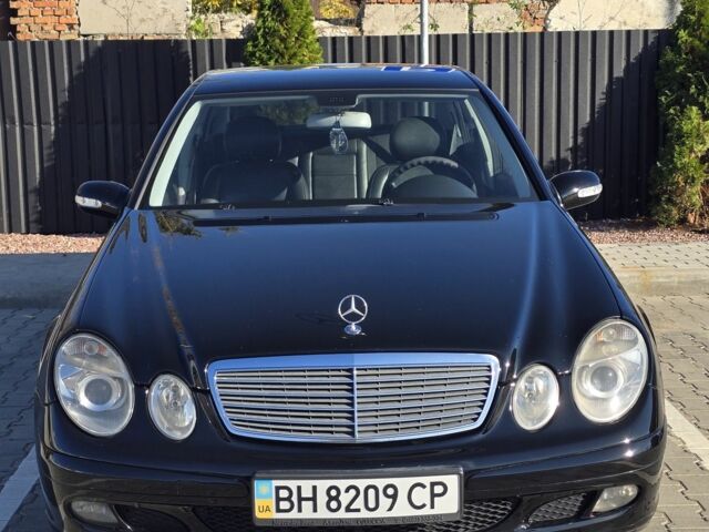 Черный Мерседес Е-Класс, объемом двигателя 1.8 л и пробегом 265 тыс. км за 6999 $, фото 1 на Automoto.ua