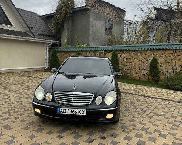 Черный Мерседес Е-Класс, объемом двигателя 2 л и пробегом 332 тыс. км за 6000 $, фото 1 на Automoto.ua