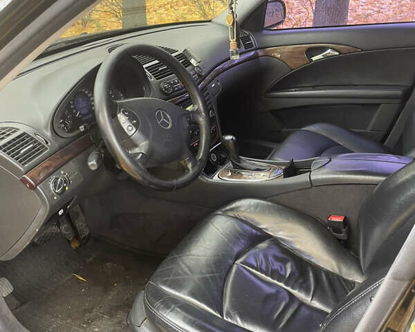 Мерседес Е-Клас 2005 у Прилуках на Automoto.ua Чорний Мерседес Е-Клас, об'ємом двигуна 1.8 л та пробігом 395 тис. км за 6499 $, фото 6 на Automoto.ua