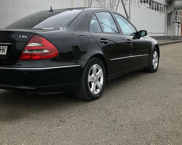 Чорний Мерседес Е-Клас, об'ємом двигуна 2.99 л та пробігом 392 тис. км за 7900 $, фото 6 на Automoto.ua