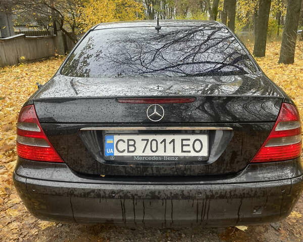 Мерседес Е-Клас 2005 у Прилуках на Automoto.ua Чорний Мерседес Е-Клас, об'ємом двигуна 1.8 л та пробігом 395 тис. км за 6499 $, фото 4 на Automoto.ua