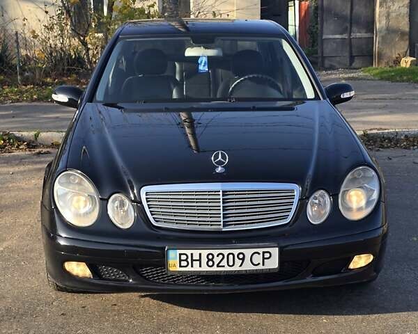 Черный Мерседес Е-Класс, объемом двигателя 1.8 л и пробегом 267 тыс. км за 6600 $, фото 1 на Automoto.ua