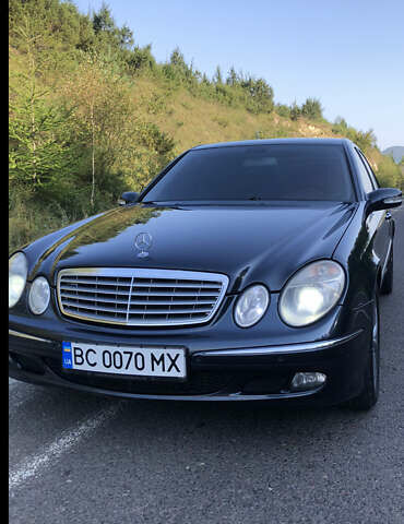 Черный Мерседес Е-Класс, объемом двигателя 2.99 л и пробегом 305 тыс. км за 8999 $, фото 1 на Automoto.ua