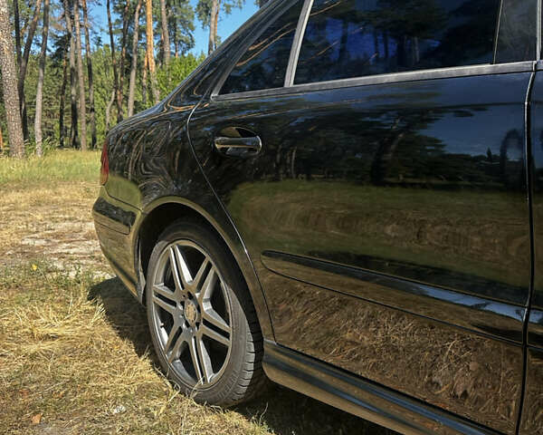 Черный Мерседес Е-Класс, объемом двигателя 1.8 л и пробегом 234 тыс. км за 8600 $, фото 5 на Automoto.ua