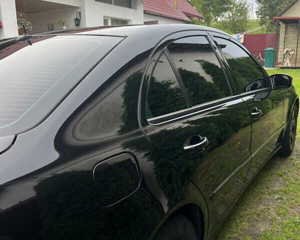 Чорний Мерседес Е-Клас, об'ємом двигуна 2.2 л та пробігом 392 тис. км за 8450 $, фото 4 на Automoto.ua