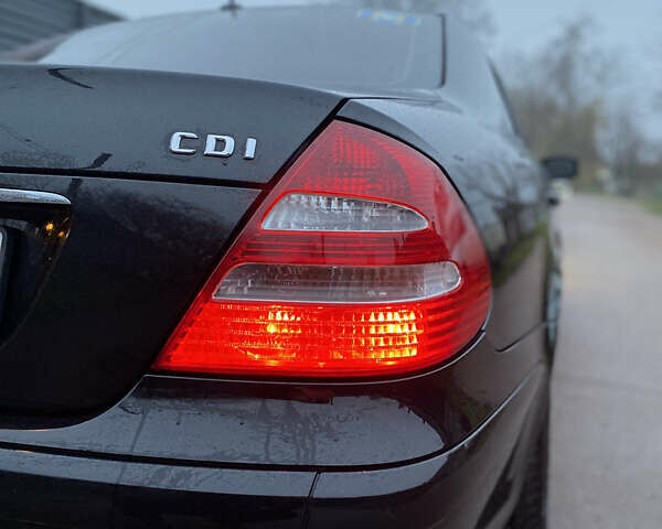 Черный Мерседес Е-Класс, объемом двигателя 2.1 л и пробегом 314 тыс. км за 8500 $, фото 2 на Automoto.ua