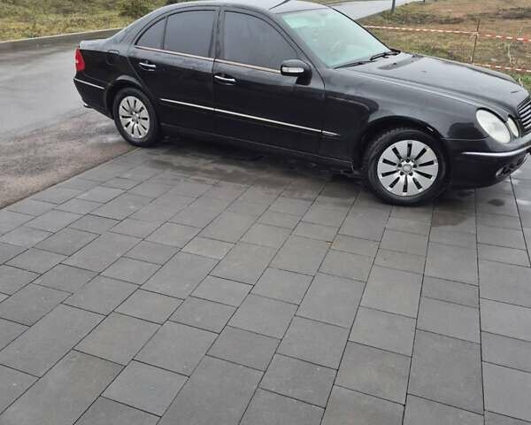 Черный Мерседес Е-Класс, объемом двигателя 3.5 л и пробегом 429 тыс. км за 6200 $, фото 2 на Automoto.ua