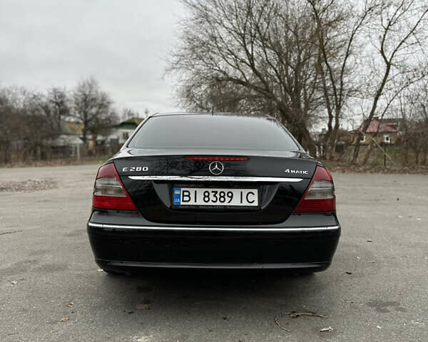 Чорний Мерседес Е-Клас, об'ємом двигуна 3 л та пробігом 232 тис. км за 8900 $, фото 6 на Automoto.ua