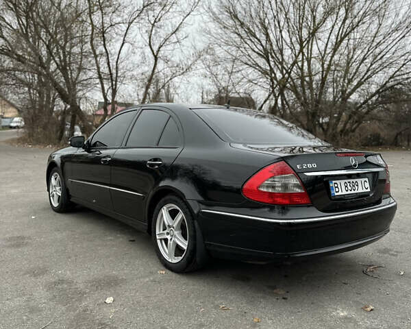 Чорний Мерседес Е-Клас, об'ємом двигуна 3 л та пробігом 232 тис. км за 8900 $, фото 5 на Automoto.ua