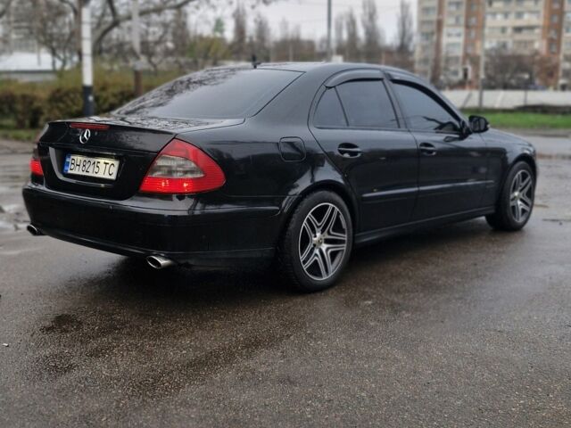Черный Мерседес Е-Класс, объемом двигателя 1.8 л и пробегом 218 тыс. км за 7700 $, фото 3 на Automoto.ua
