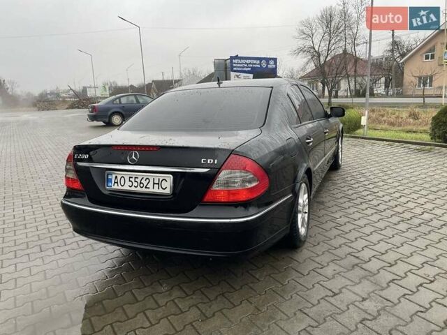 Черный Мерседес Е-Класс, объемом двигателя 2.1 л и пробегом 375 тыс. км за 8200 $, фото 1 на Automoto.ua