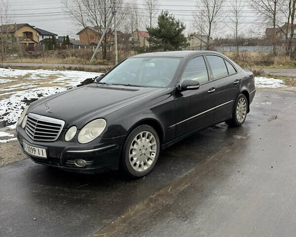 Черный Мерседес Е-Класс, объемом двигателя 3 л и пробегом 214 тыс. км за 8700 $, фото 1 на Automoto.ua