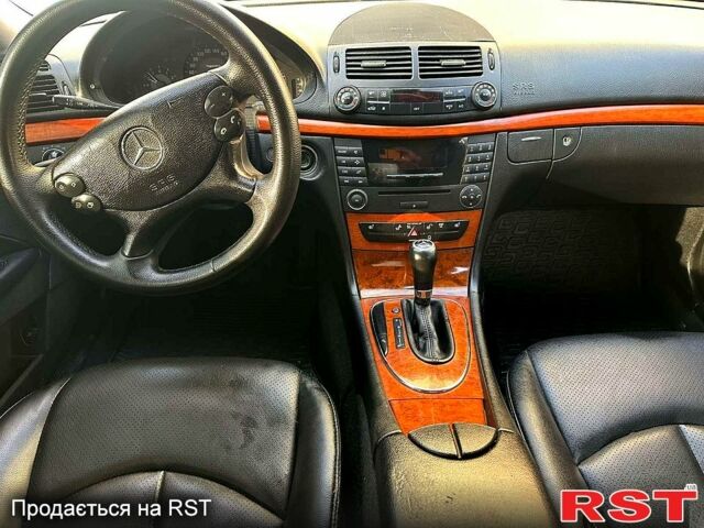 Черный Мерседес Е-Класс, объемом двигателя 2.1 л и пробегом 460 тыс. км за 7500 $, фото 4 на Automoto.ua