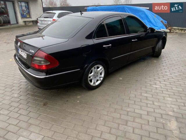 Черный Мерседес Е-Класс, объемом двигателя 2.2 л и пробегом 297 тыс. км за 8900 $, фото 4 на Automoto.ua