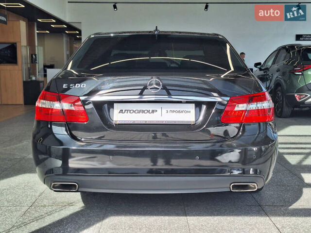 Черный Мерседес Е-Класс, объемом двигателя 5.5 л и пробегом 201 тыс. км за 16300 $, фото 2 на Automoto.ua